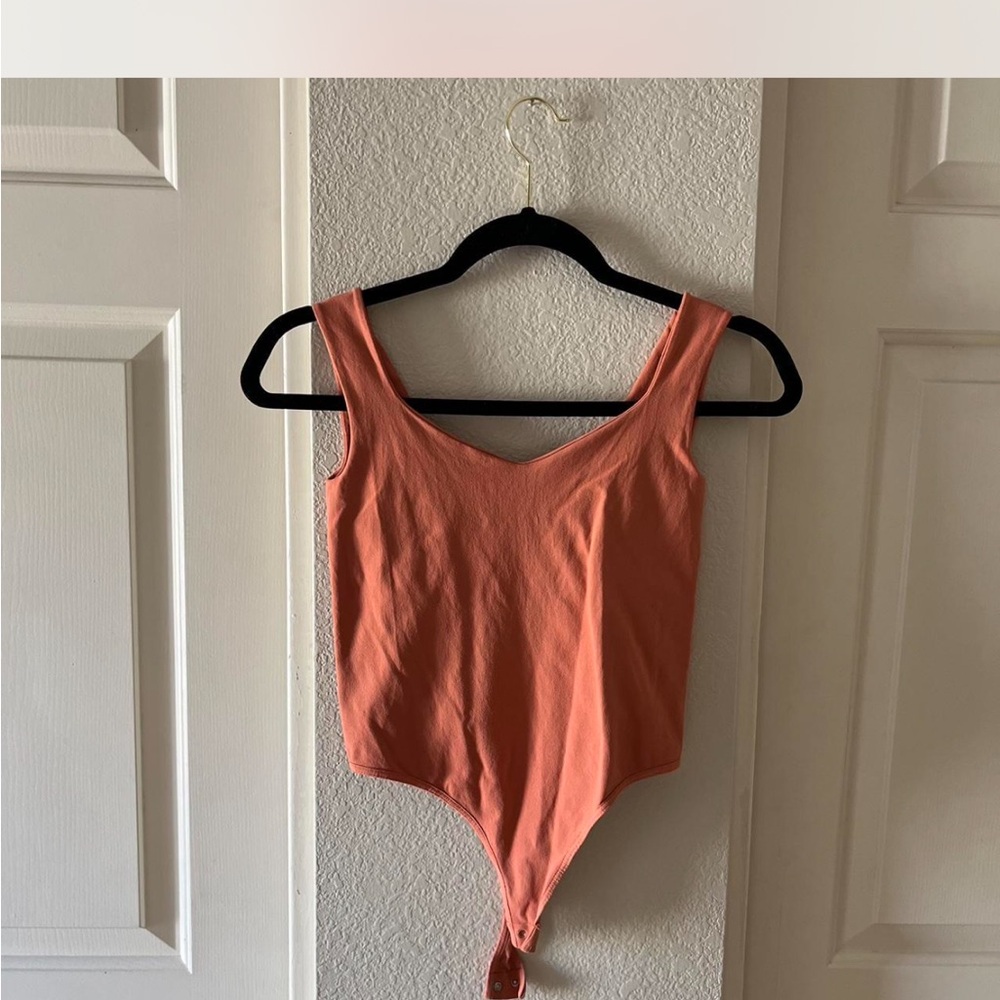 Coral Sleeveless Bodysuit